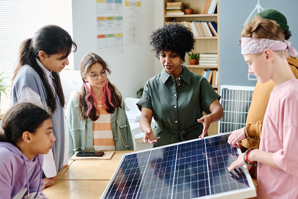 Teacher talking about solar panel to students